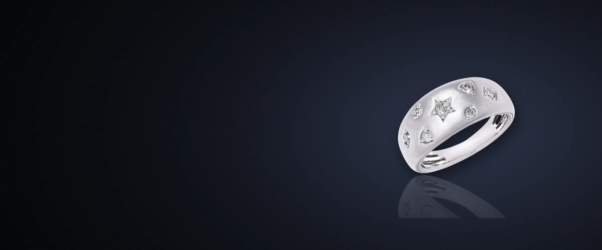 PureRadiance white gold dome ring with star-set diamonds