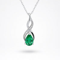 Emerald Modern Pendant in 14 Karat White Gold