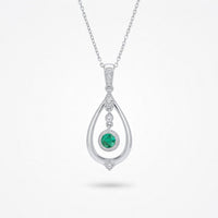 Emerald Vintage Inspired Pendant in 14 Karat White Gold