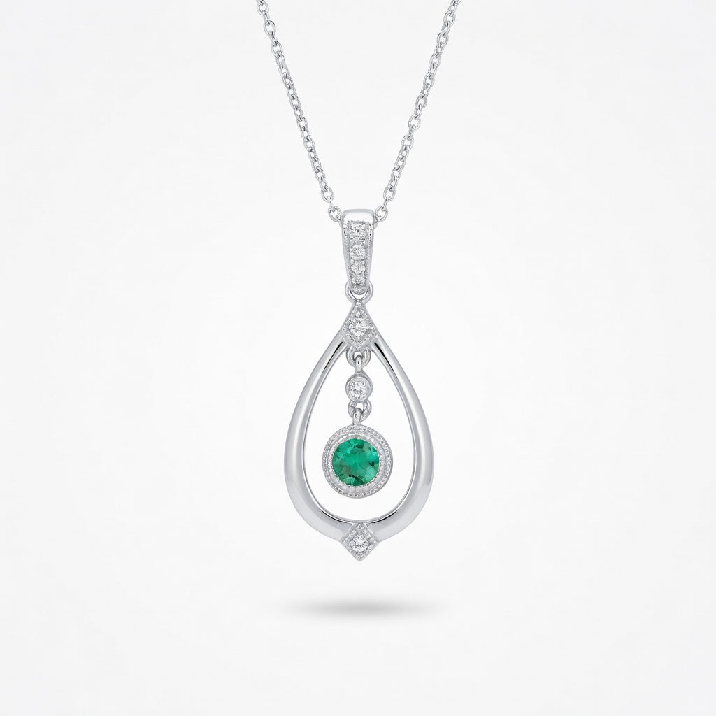 Emerald Vintage Inspired Pendant in 14 Karat White Gold